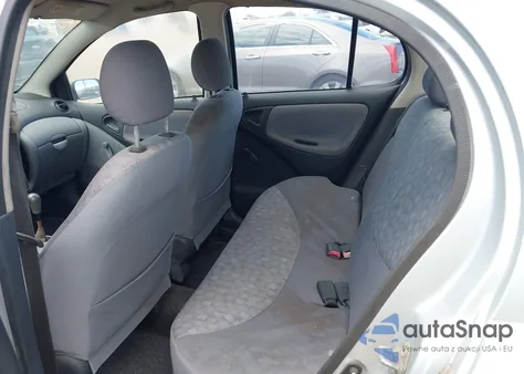 2001 Toyota Echo из США, поврежденный, VIN JTDBT123210123443